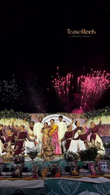 Fireworks over a half-saree ceremony stage